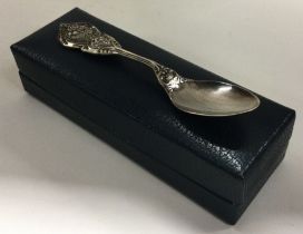OF ROYAL INTEREST: A cased silver commemorative christening spoon. By Franklin Mint.