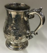 An Indian Colonial silver quart sized mug. Calcutta. Circa 1864. By Charles Nephew & Co.