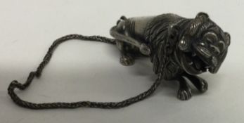 An unusual Chinese silver figure of a dog.