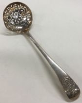 A silver pierced ladle of Admiralty pattern. Sheffield 1877. By Walker & Hall.