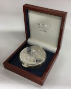 A commemorative cased silver hinged snuff box depicting Winston Churchill's life 1874 - 1965.