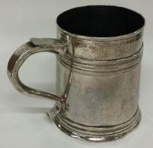 A Queen Anne silver mug. London 1716.