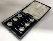 A cased set of six silver and stone set spoons. 1926. By Bernard Instone.