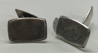 A pair of Sterling silver cufflinks.