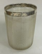 A Continental silver and glass beaker. Marked 800.
