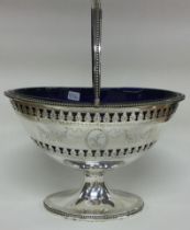 PETER AND JONATHAN BATEMAN: An 18th Century silver swing handled basket. London 1790.