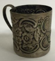An 18th Century silver mug. Marked to base.