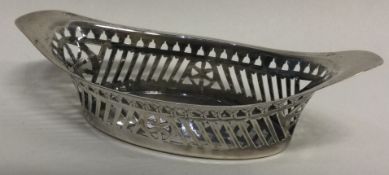 A small oval silver sweet dish.