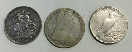 An 1891 silver crown together with two others.
