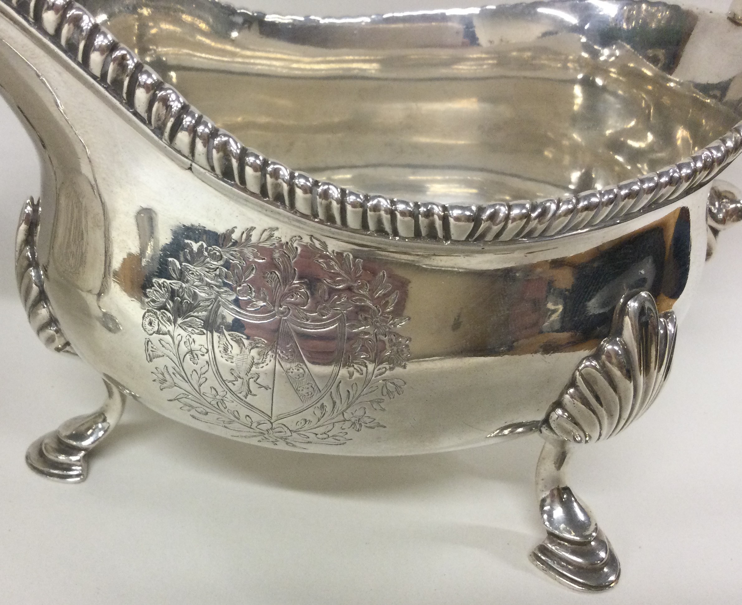 A good heavy pair of Georgian silver sauce boats with central armorials. London 1767. - Image 2 of 3
