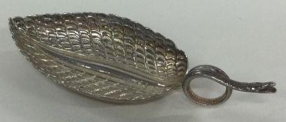 A George III silver leaf shaped caddy spoon with naturalistic snake handle. Birmingham 1806.