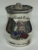 A rare American silver mug enamelled with flags. Circa 1900.