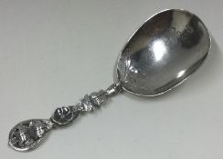 A Victorian silver caddy spoon. By H&T.