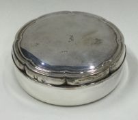 BOUCHERON: A circular silver box with lift off cover.