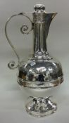 A rare Victorian silver communion wine jug. Sheffield 1879. By Henry Wilkinson.