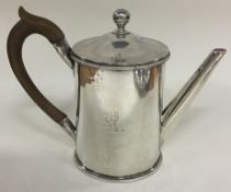 A good Georgian silver argyle of typical form with fitted interior and crested sides. London 1804.