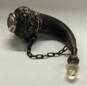 A Scottish silver vinaigrette in the form of a horn with gem stone centre. Circa 1880.