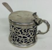 A Victorian pierced silver mustard pot with BGL. London 1842. By William Chawner.