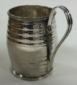A Georgian silver barrel shaped mug. London 1778.