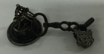 A good cast Georgian silver seal together with a steel padlock.