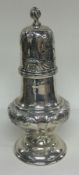 A Victorian silver sugar caster embossed with flowers. Birmingham 1897. By Thomas Hayes.