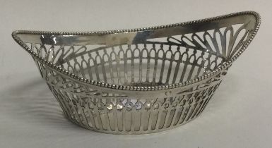 An oval pierced silver basket.