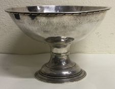 An Arts & Crafts 20th Century silver presentation cup.