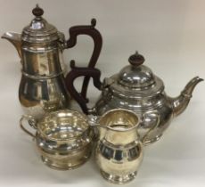A heavy silver four-piece tea service of baluster form. Birmingham.
