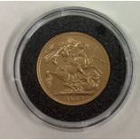 An 1887 gold Full Sovereign coin.