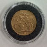A 1914 gold Full Sovereign coin.