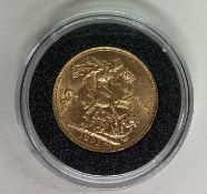 An 1891 gold Full Sovereign coin.