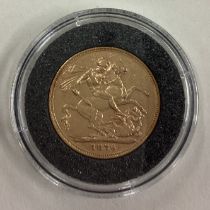 An 1876 gold Full Sovereign coin.