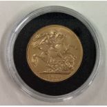 A 1920 gold Full Sovereign coin.