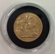A 1920 gold Full Sovereign coin.
