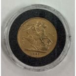 An 1887 gold Full Sovereign coin.
