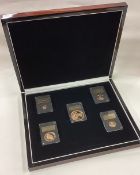 A good cased limited edition gold Sovereign coin set. Designed by Angela Pistrucci.