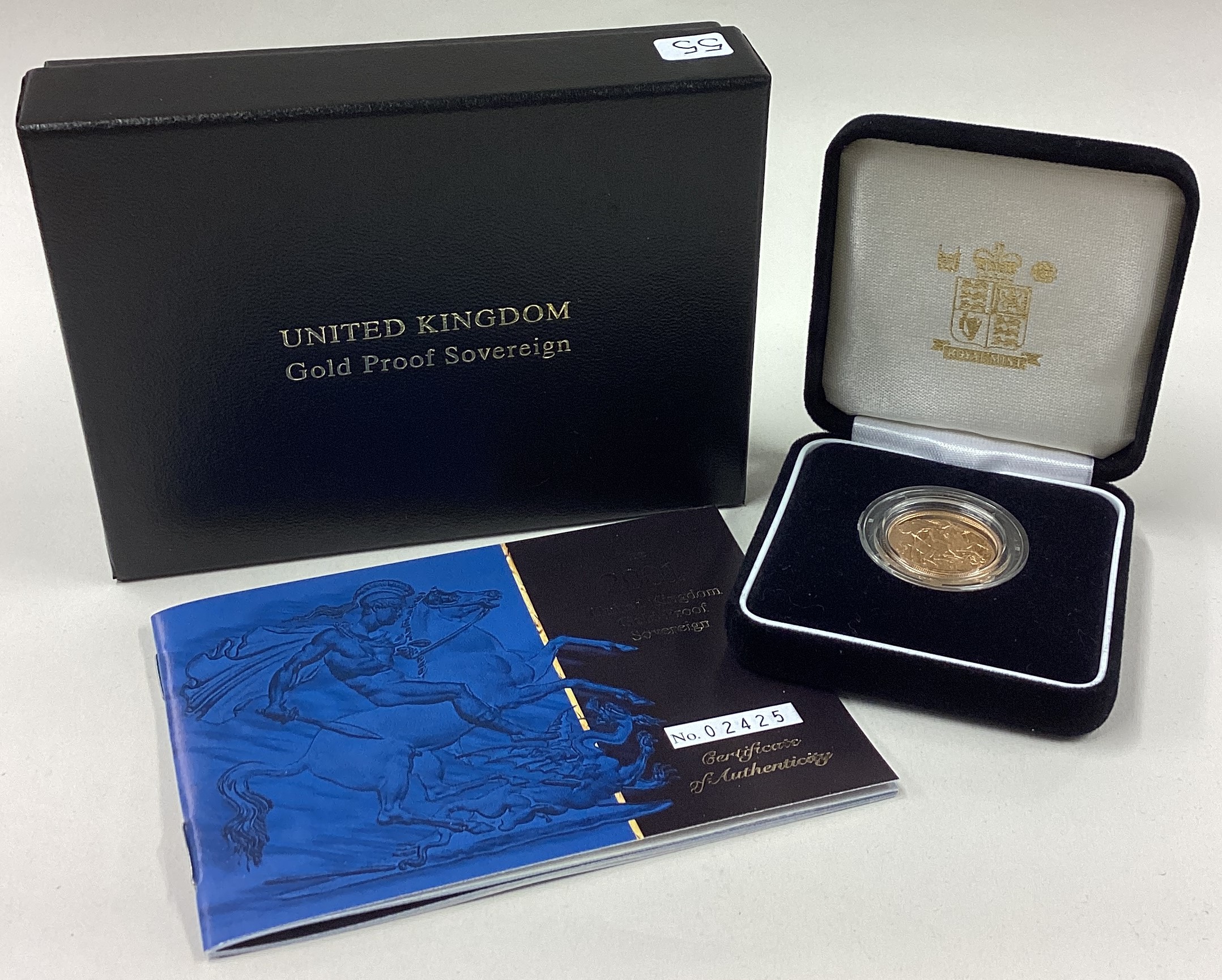A cased 2001 gold Proof Full Sovereign coin.