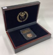 A cased 2021 gold Full Sovereign coin.