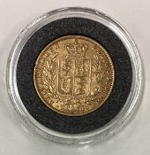 An 1871 Victorian gold Full Sovereign coin.
