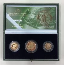 A cased 2003 gold three-coin Sovereign collection.