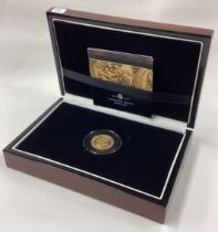 A cased 1817 George III gold Full Sovereign coin.