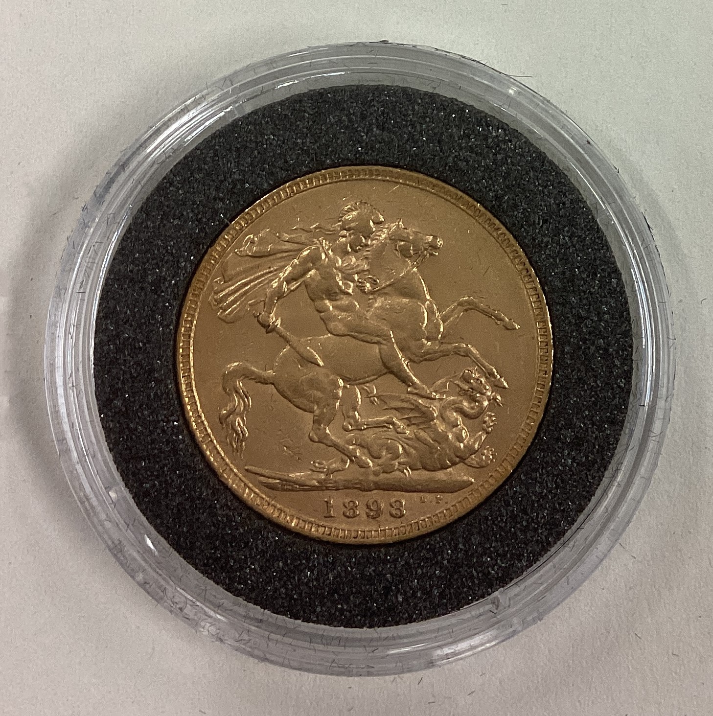 An 1898 gold Full Sovereign coin.
