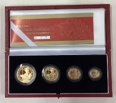 A cased 2002 gold Proof Britannia four-coin collection.