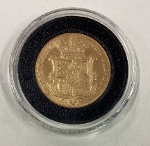 An 1826 gold shield back Full Sovereign coin.