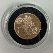 A cased 2018 gold Full Sovereign coin.