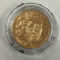 An 1835 gold shield back Full Sovereign coin.