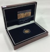 A cased 1817 George III gold Half Sovereign coin.