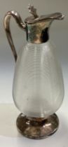 A large silver plated Communion jug.