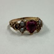 A good Antique pearl set ring in 18 carat gold mount.