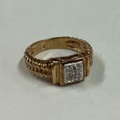 A small diamond cluster ring in 9 carat rope twist setting.
